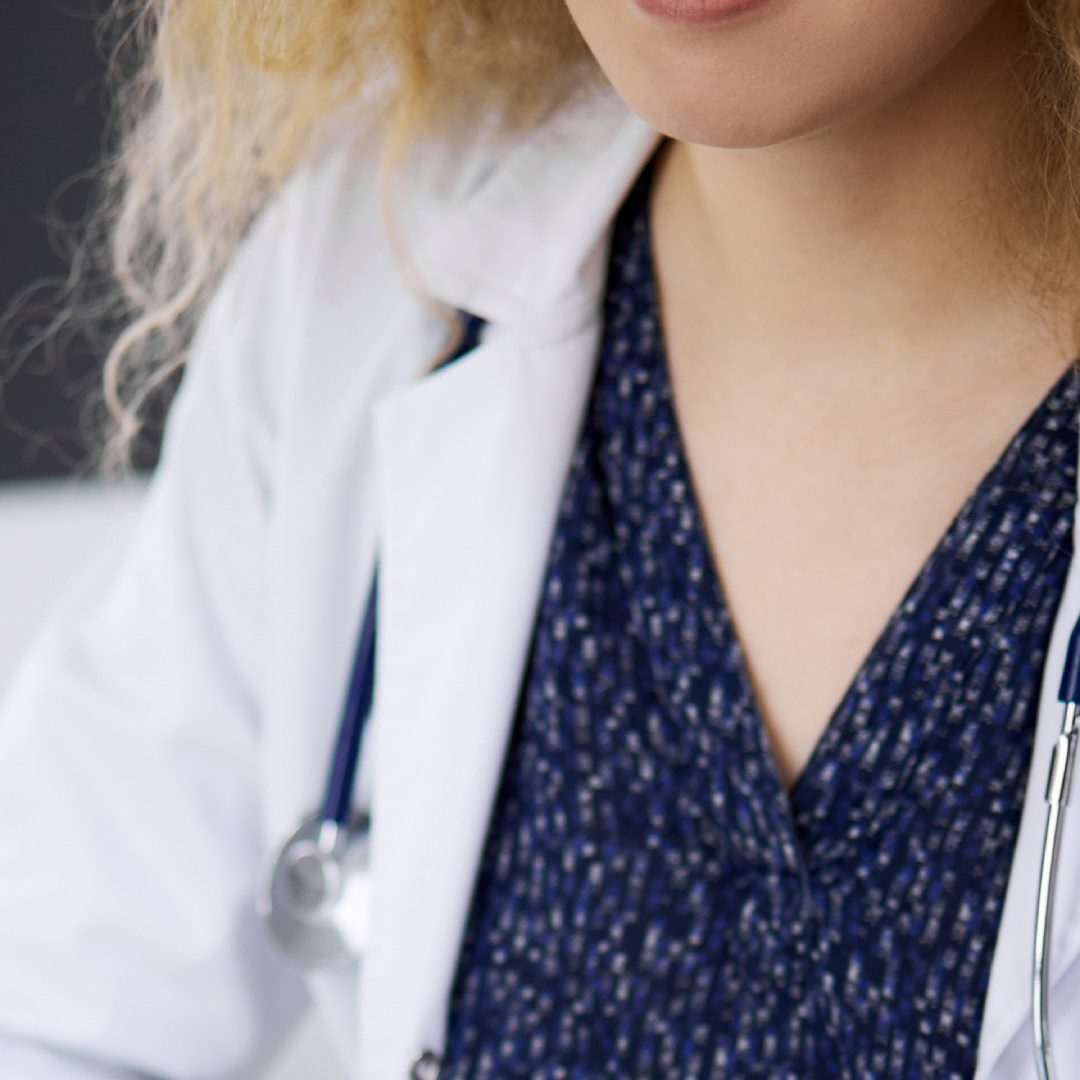 Doctor in white coat and stethoscope.