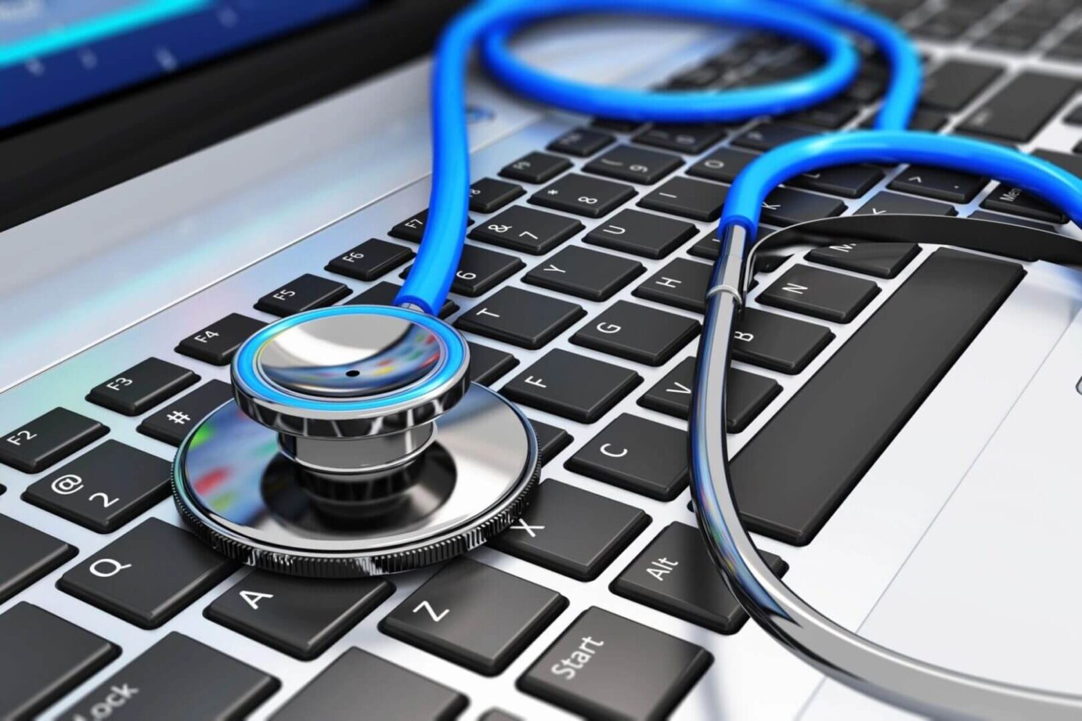 Stethoscope on a laptop keyboard.